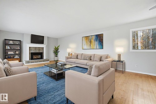 4902 63 Street, Rural Lac Ste. Anne County, AB - Indoor Photo Showing Living Room With Fireplace
