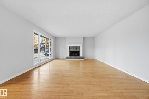 4902 63 Street, Rural Lac Ste. Anne County, AB - Indoor Photo Showing Living Room With Fireplace