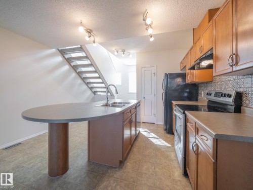 127 2051 Towne Centre Boulevard, Edmonton, AB - Indoor Photo Showing Kitchen With Double Sink
