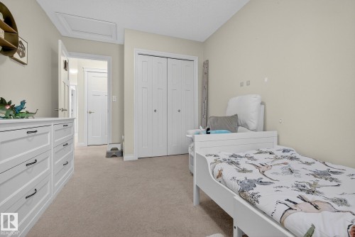64 Hamilton Court, Spruce Grove, AB - Indoor Photo Showing Bedroom