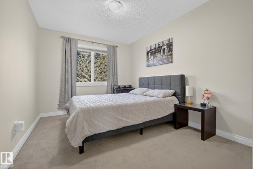 64 Hamilton Court, Spruce Grove, AB - Indoor Photo Showing Bedroom