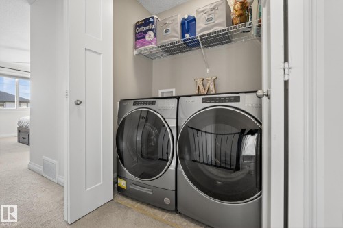 64 Hamilton Court, Spruce Grove, AB - Indoor Photo Showing Laundry Room