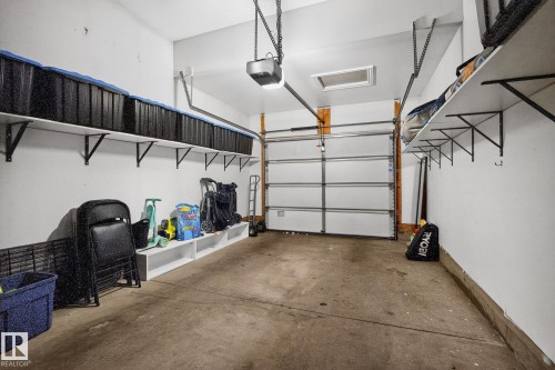 64 Hamilton Court, Spruce Grove, AB - Indoor Photo Showing Garage