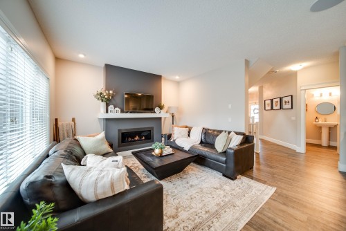 4373 Crabapple Crescent, Edmonton, AB - Indoor Photo Showing Living Room With Fireplace