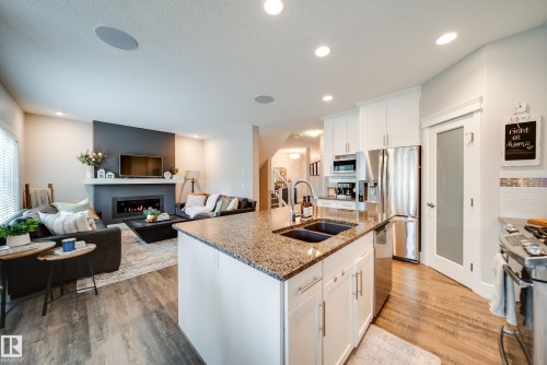 4373 Crabapple Crescent, Edmonton, AB - Indoor Photo Showing Kitchen With Fireplace With Double Sink With Upgraded Kitchen