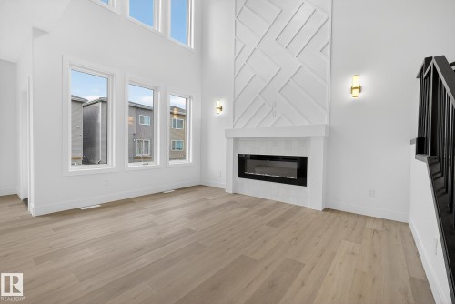 3306 Chickadee Drive, Edmonton, AB - Indoor Photo Showing Living Room With Fireplace