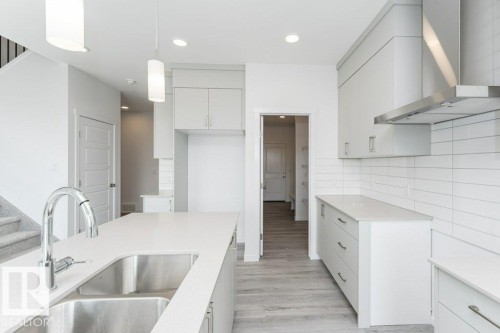 2361 Egret Way, Edmonton, AB - Indoor Photo Showing Kitchen With Double Sink
