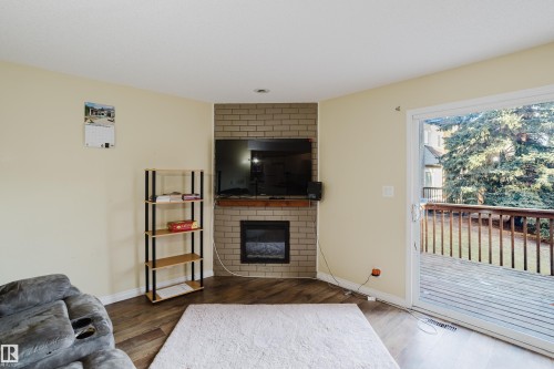 14612 121 Street, Edmonton, AB - Indoor Photo Showing Living Room With Fireplace
