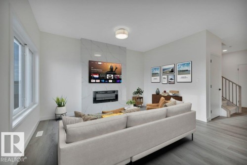 5259 47 Avenue, Calmar, AB - Indoor Photo Showing Living Room With Fireplace