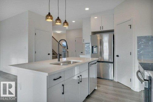 5259 47 Avenue, Calmar, AB - Indoor Photo Showing Kitchen With Double Sink With Upgraded Kitchen