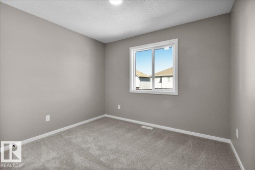 135 Hilton Cove, Spruce Grove, AB - Indoor Photo Showing Other Room