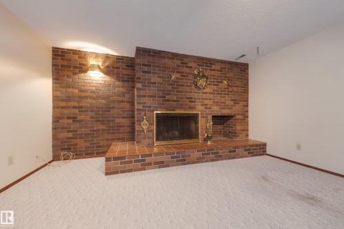 7620 136 Avenue, Edmonton, AB - Indoor With Fireplace