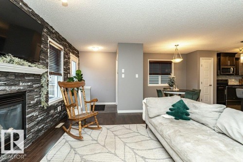 1017 Watt Promenade, Edmonton, AB - Indoor Photo Showing Living Room With Fireplace