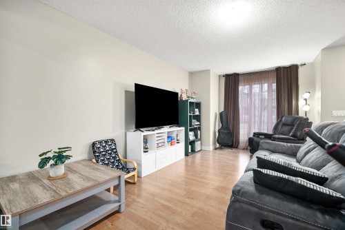 2063 Trumpeter Way, Edmonton, AB - Indoor Photo Showing Living Room