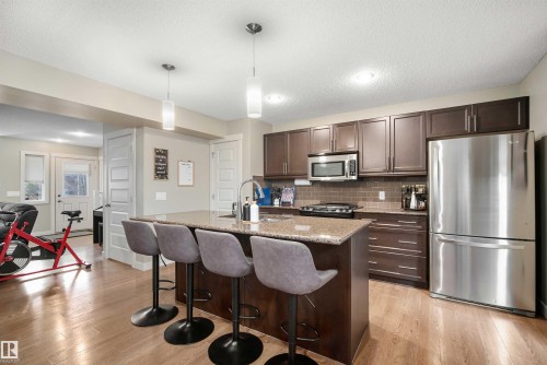 2063 Trumpeter Way, Edmonton, AB - Indoor Photo Showing Kitchen With Upgraded Kitchen