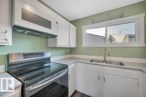 1795 Lakewood Road S, Edmonton, AB - Indoor Photo Showing Kitchen With Double Sink