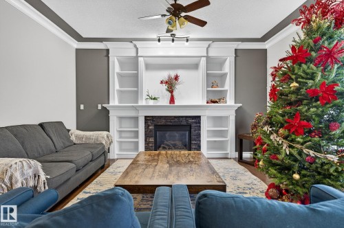 1232 Cunningham Drive, Edmonton, AB - Indoor Photo Showing Living Room With Fireplace