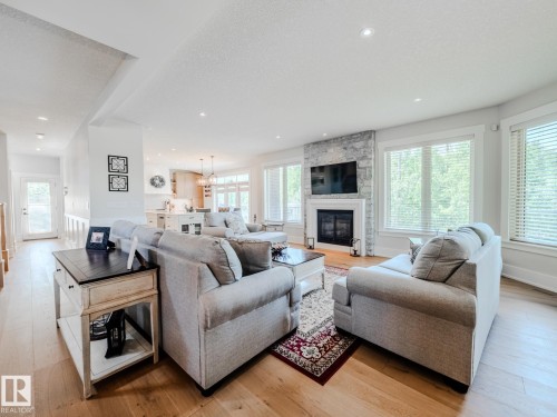 27 23033 Wye Road, Rural Strathcona County, AB - Indoor Photo Showing Living Room With Fireplace