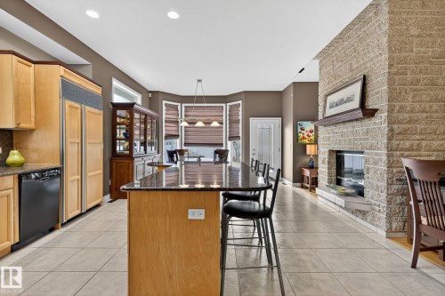 8835 159A Avenue, Edmonton, AB - Indoor Photo Showing Kitchen With Fireplace