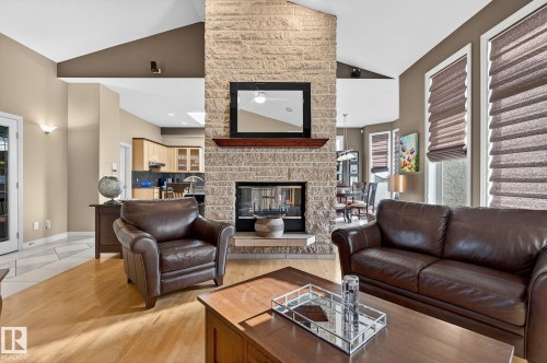 8835 159A Avenue, Edmonton, AB - Indoor Photo Showing Living Room With Fireplace