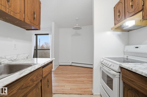 305 11040 82 Street, Edmonton, AB - Indoor Photo Showing Kitchen With Double Sink