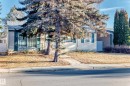 View of front of property with roof with shingles and stucco siding - Edmonton, AB  - Outdoor 