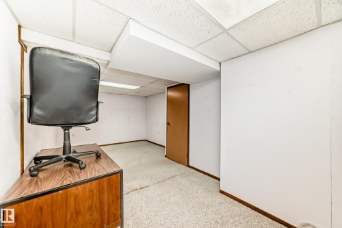 Home office featuring baseboards and a paneled ceiling - Edmonton, AB - Indoor