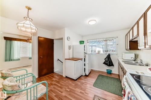Edmonton, AB - Indoor Photo Showing Kitchen With Double Sink