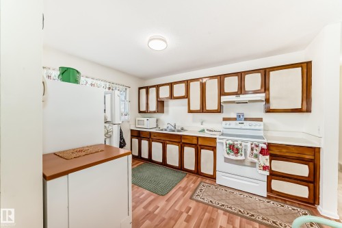 Edmonton, AB - Indoor Photo Showing Kitchen With Double Sink