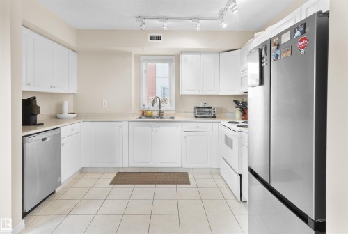 605 9741 110 Street Nw, Edmonton, AB - Indoor Photo Showing Kitchen With Double Sink