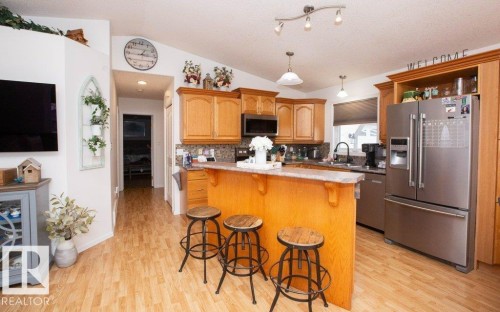 4707 50 Street, Clyde, AB - Indoor Photo Showing Kitchen With Double Sink