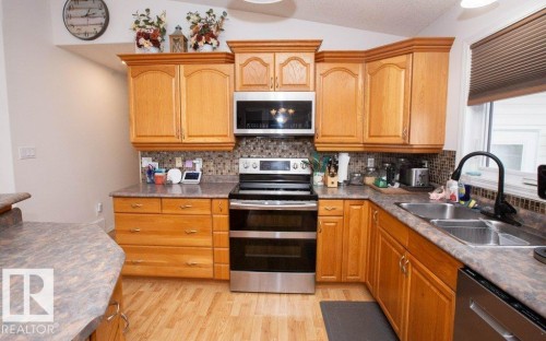 4707 50 Street, Clyde, AB - Indoor Photo Showing Kitchen With Double Sink