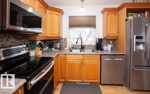 4707 50 Street, Clyde, AB - Indoor Photo Showing Kitchen With Double Sink