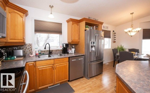 4707 50 Street, Clyde, AB - Indoor Photo Showing Kitchen With Double Sink
