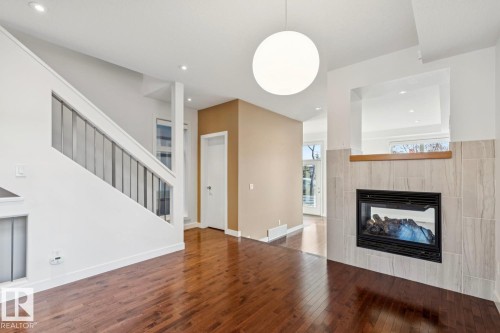 11042 131 Street, Edmonton, AB - Indoor Photo Showing Other Room With Fireplace