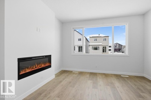 8960 Elves Loop, Edmonton, AB - Indoor With Fireplace