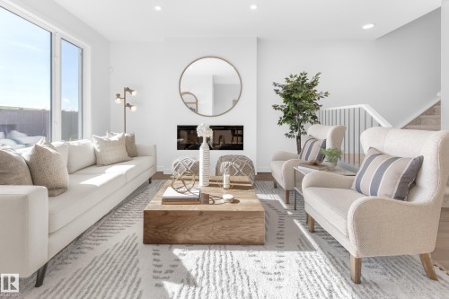 8960 Elves Loop, Edmonton, AB - Indoor Photo Showing Living Room With Fireplace