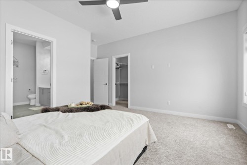82 Meadowland Way, Spruce Grove, AB - Indoor Photo Showing Bedroom