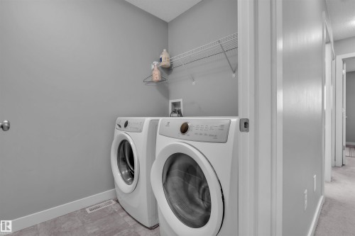 1748 27 Street, Edmonton, AB - Indoor Photo Showing Laundry Room