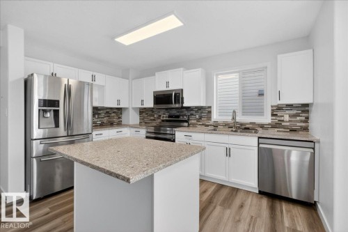 3323 26 Avenue, Edmonton, AB - Indoor Photo Showing Kitchen With Upgraded Kitchen