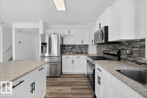 3323 26 Avenue, Edmonton, AB - Indoor Photo Showing Kitchen With Upgraded Kitchen