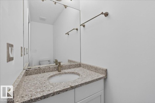 3323 26 Avenue, Edmonton, AB - Indoor Photo Showing Bathroom