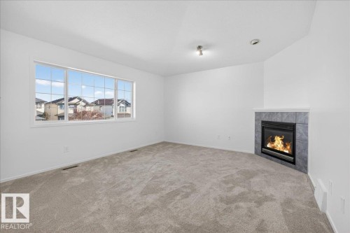 3323 26 Avenue, Edmonton, AB - Indoor With Fireplace