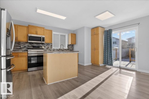 3323 26 Avenue, Edmonton, AB - Indoor Photo Showing Kitchen With Stainless Steel Kitchen
