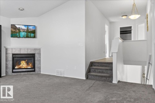 3323 26 Avenue, Edmonton, AB - Indoor With Fireplace