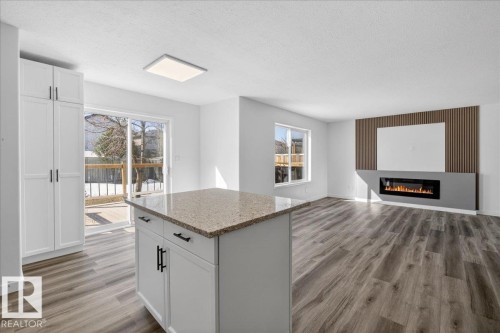 3323 26 Avenue, Edmonton, AB - Indoor With Fireplace