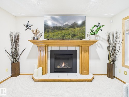 92 Dufferin Street, St. Albert, AB - Indoor Photo Showing Living Room With Fireplace