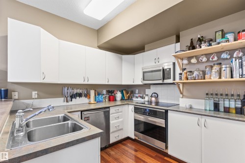 417 10717 83 Avenue, Edmonton, AB - Indoor Photo Showing Kitchen With Double Sink