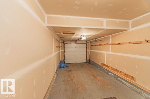 114 Radcliffe Wynd, Fort Saskatchewan, AB - Indoor Photo Showing Garage