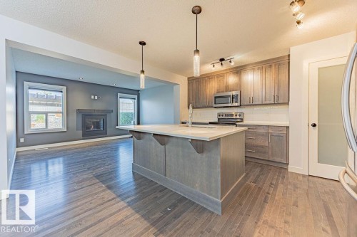 114 Radcliffe Wynd, Fort Saskatchewan, AB - Indoor Photo Showing Kitchen With Stainless Steel Kitchen With Upgraded Kitchen